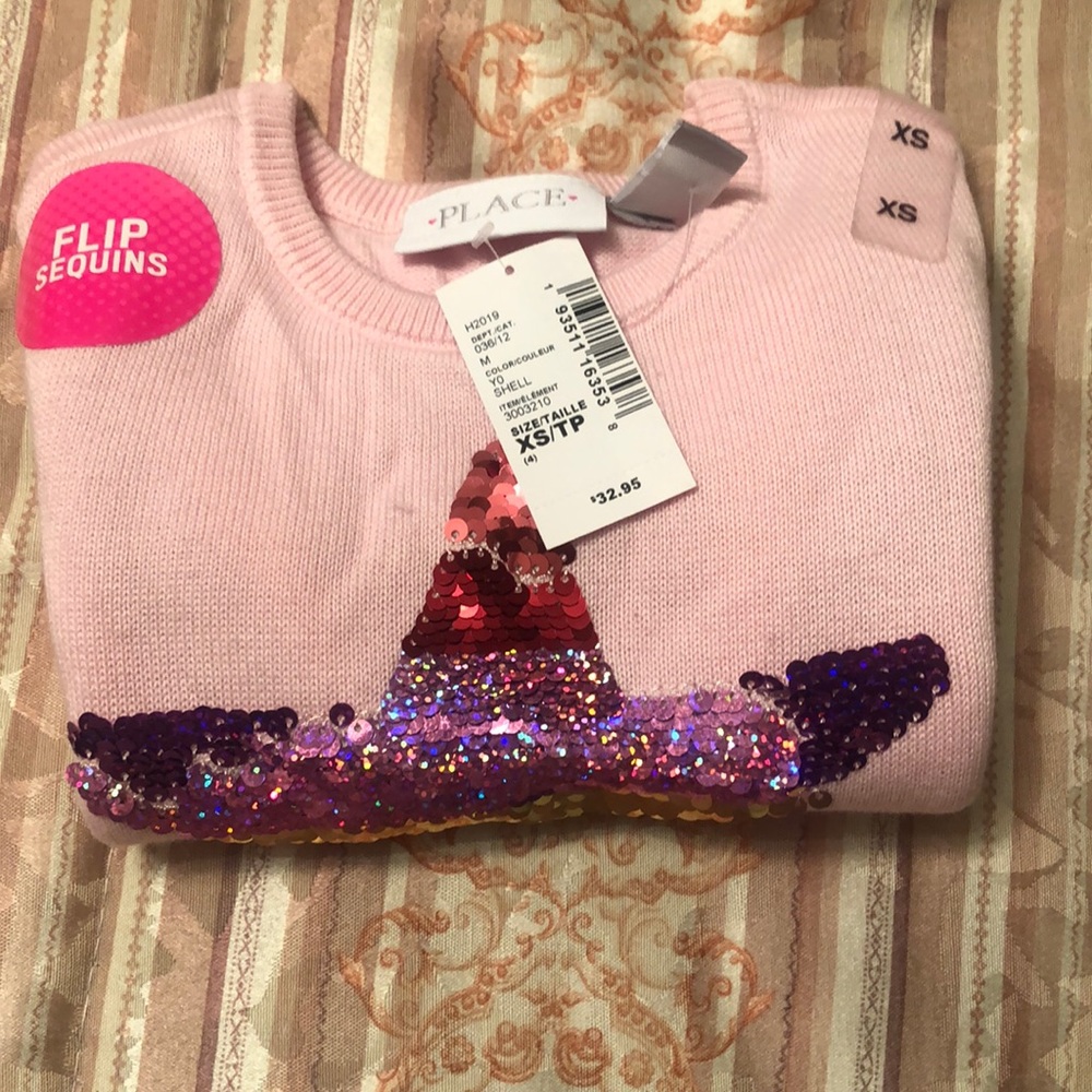 Toddler sized pink sweater for girls